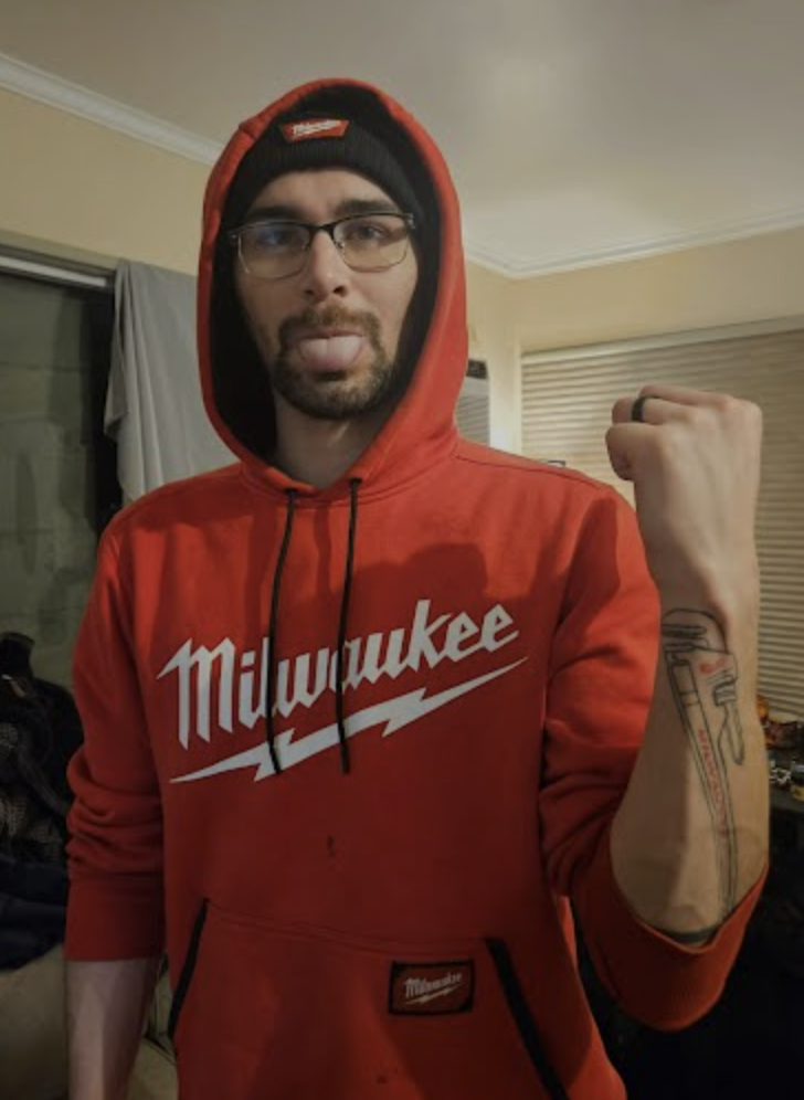 Nathan wearing his red Milwaukee hoodie